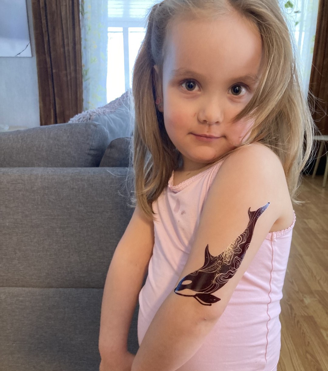 Maria met orka tattoo.jpeg